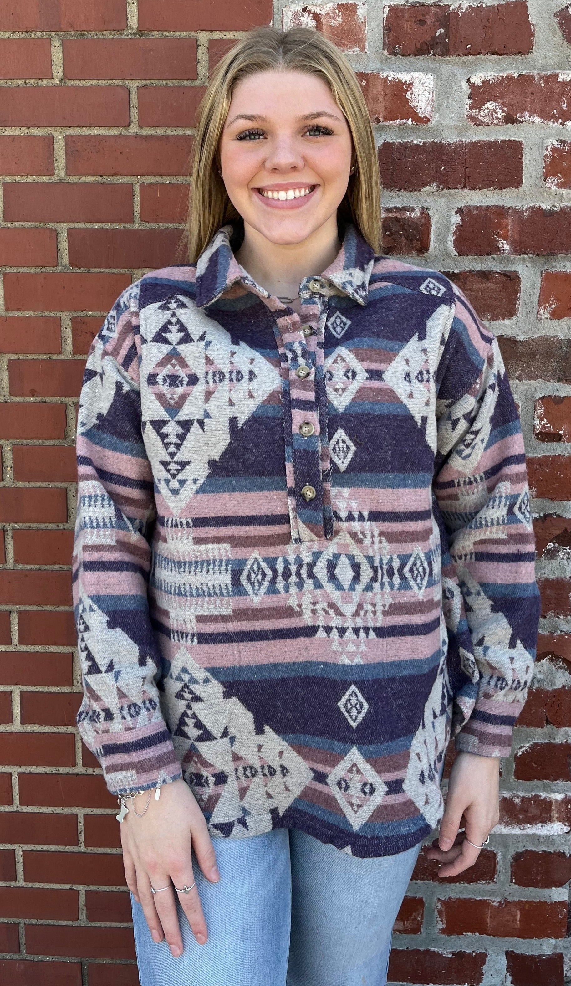 blond model wearing Aztec printed jacket with four buttons in front