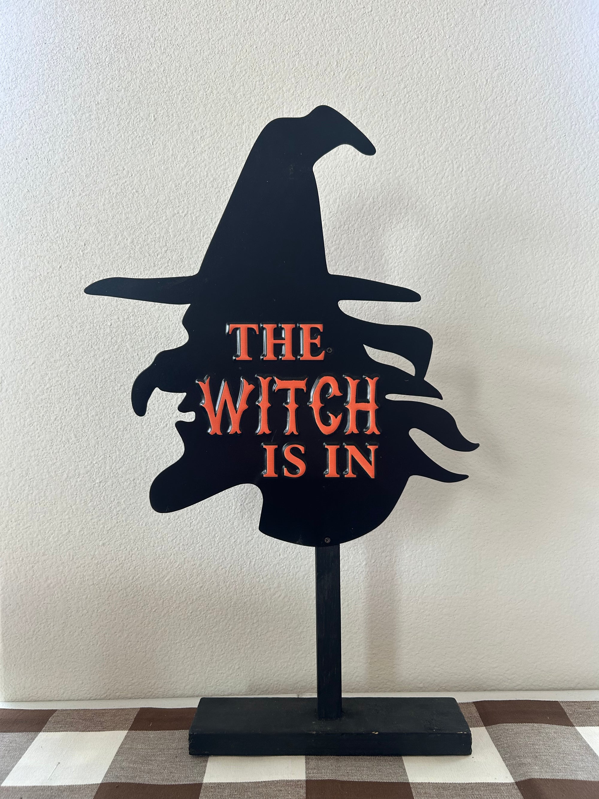 The Witch Is In Metal Sign